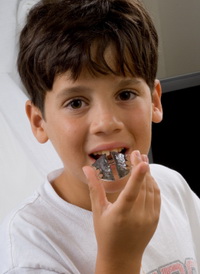 Boy With Retainer - Pediatric and Cosmetic Dentists Keller, and Southlake TX - Donohue & Donohue, DDS